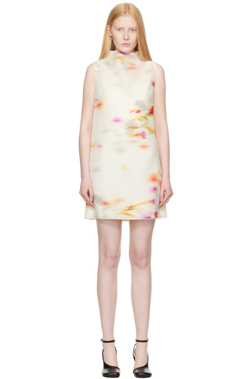 Reversible semi-sheer silk organdy minidress. Graphic pattern printed throughout. 

Reverse in white silk organdy. Graphic pattern printed throughout. 

· Mock neck
· Button fastening and keyhole at back
· Detachable silk crêpe slip

Supplier color: Ivory/Multicolor