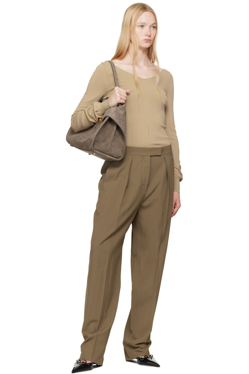Viscose- and virgin wool-blend twill trousers. 

· Three-pocket styling
· Zip fly 
· Invertd pleats at front 
· Creased legs 
· Partial plain-woven cotton lining

Supplier color: Lead