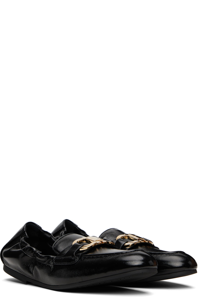 Crackled patent lambskin loafers in black. 

· Moc toe
· Logo hardware at vamp
· Elasticized collar
· Treaded rubber sole 
· Gold-tone hardware

Supplier color: Black