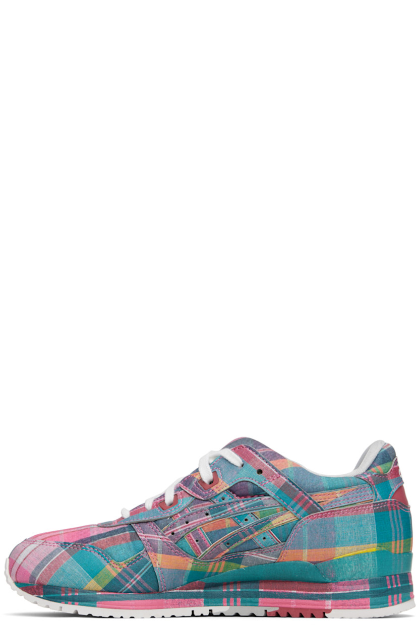 Low-top plain-woven and buffed faux-leather sneakers in pink.

· Check pattern printed throughout
· Lace-up closure
· Vent at modified padded tongue
· Padded collar
· Logo appliqués and perforations at sides
· Logos printed at outer side and heel tab
· Faille lining
· Treaded rubber sole

Part of the Comme des Garçons Shirt x ASICS collaboration.

Supplier color: Pink/Multi