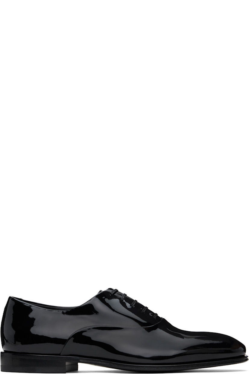 Handcrafted patent calfskin oxfords in black.

· Lace-up closure
· Buffed leather lining
· Stacked leather heel with rubber injection
· Leather sole

Supplier color: Black