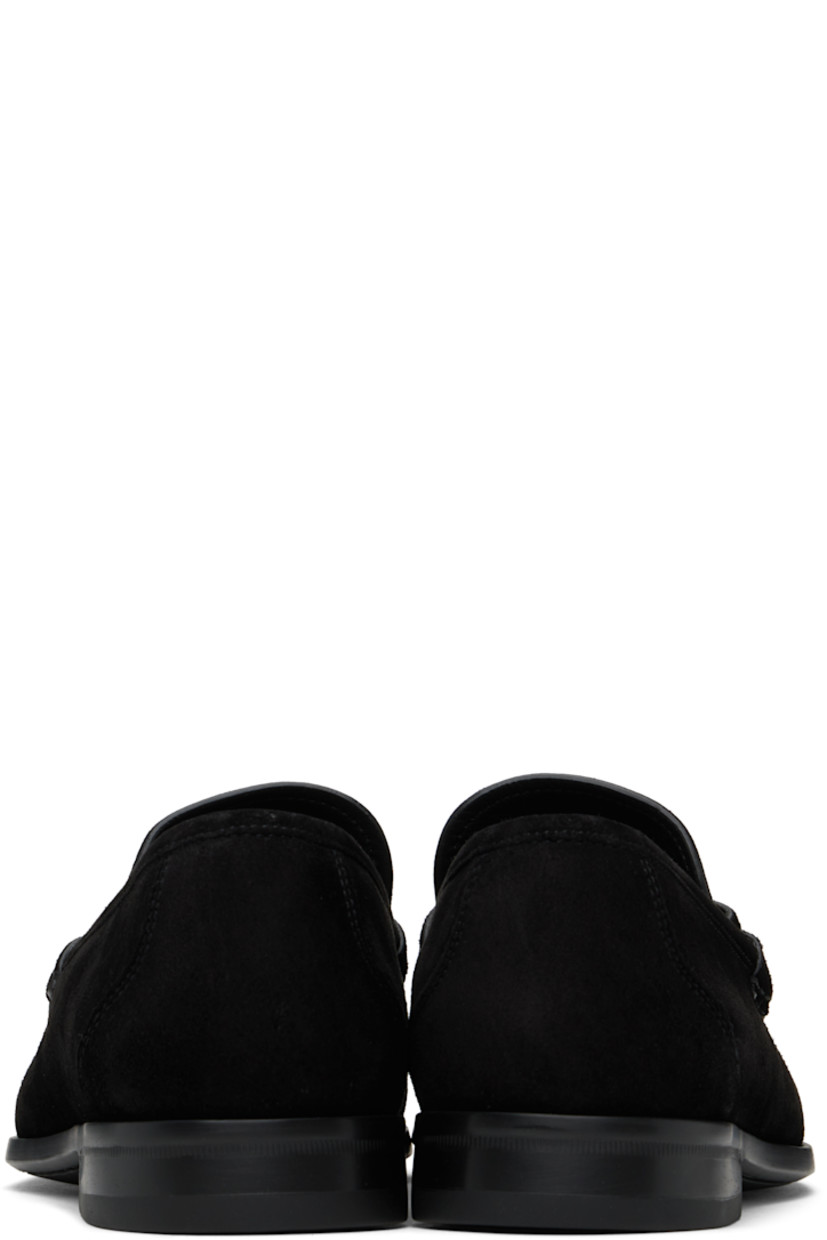 Calfskin suede loafers in black.

· Square moc toe
· Logo hardware at vamp
· Grained leather lining
· Rubber block heel
· Rubber sole
· Gold-tone hardware

Supplier color: Nero