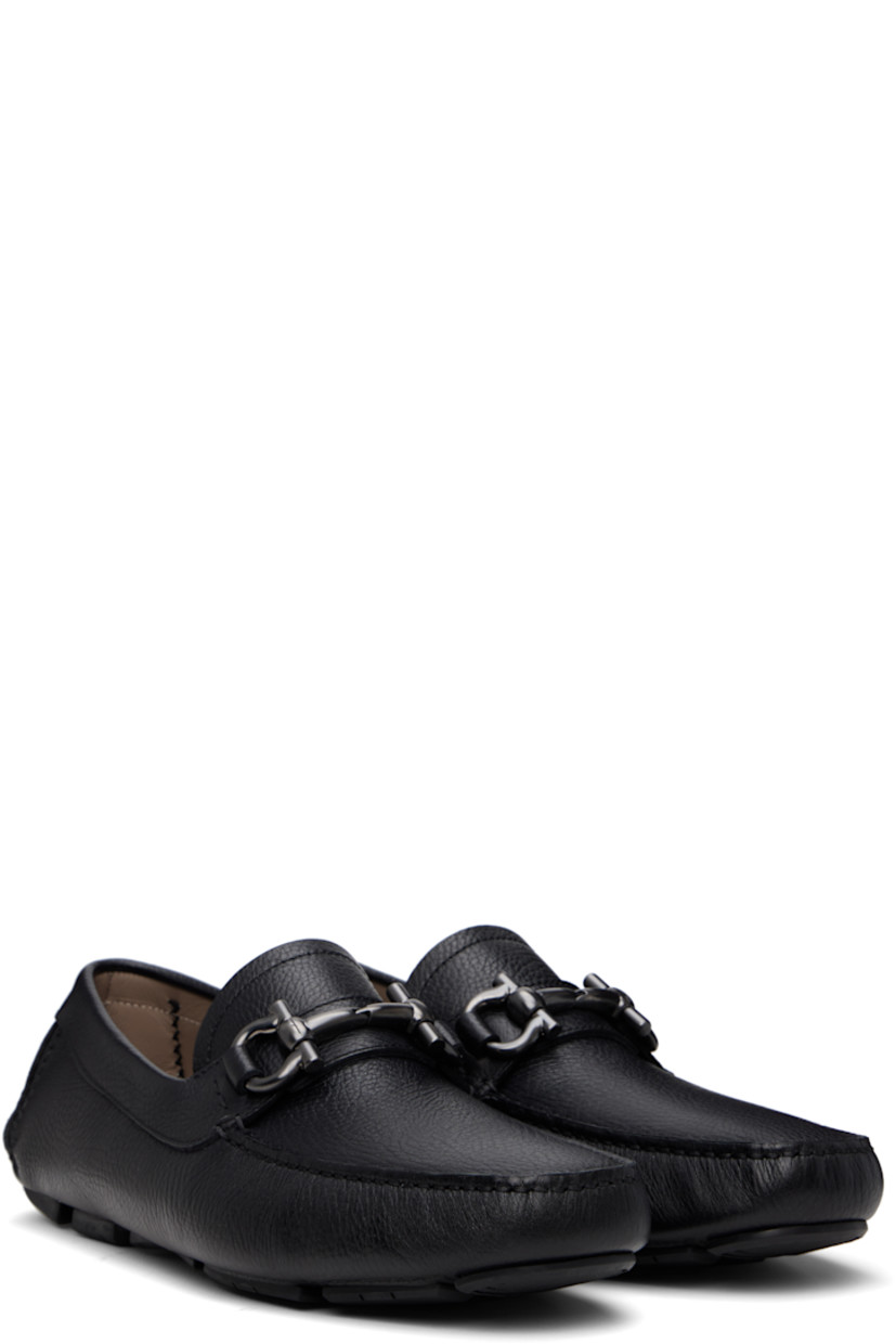 Handcrafted lightweight hammered calfskin loafers in black. 

· Moc toe
· Strap with logo hardware at vamp
· Grained calfskin lining
· Treaded rubber sole

Supplier color: Black