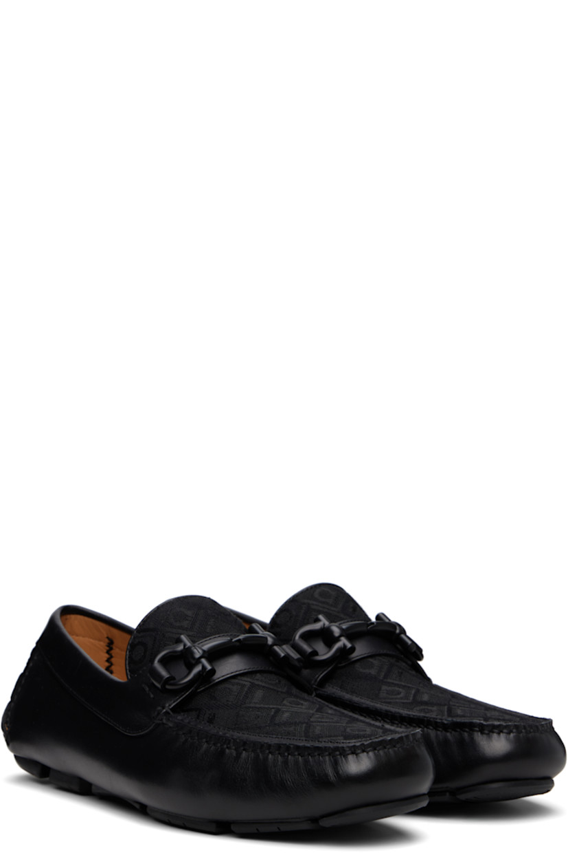 Lightweight buffed calfskin and twill loafers in black. 

· Hand-stitched detailing throughout
· Moc toe
· Jacquard logo pattern at vamp
· Strap with logo hardware
· Buffed calfskin lining
· Treaded rubber sole

Supplier color: Black