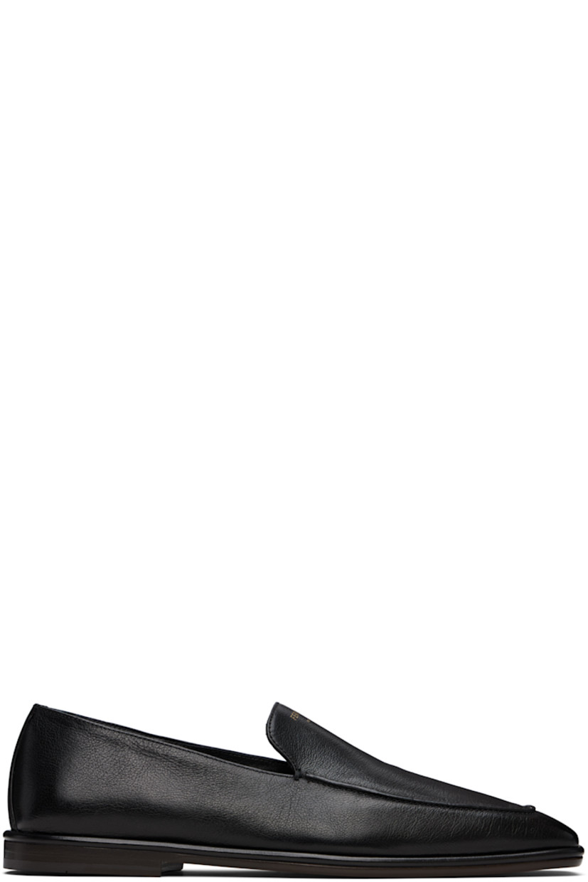 Hammered calfskin loafers in black. 

· Square moc toe
· Gold-tone logo stamp at tongue
· Grained calfskin lining
· Stacked calfskin heel with rubber injection
· Calfskin sole

Supplier color: Black