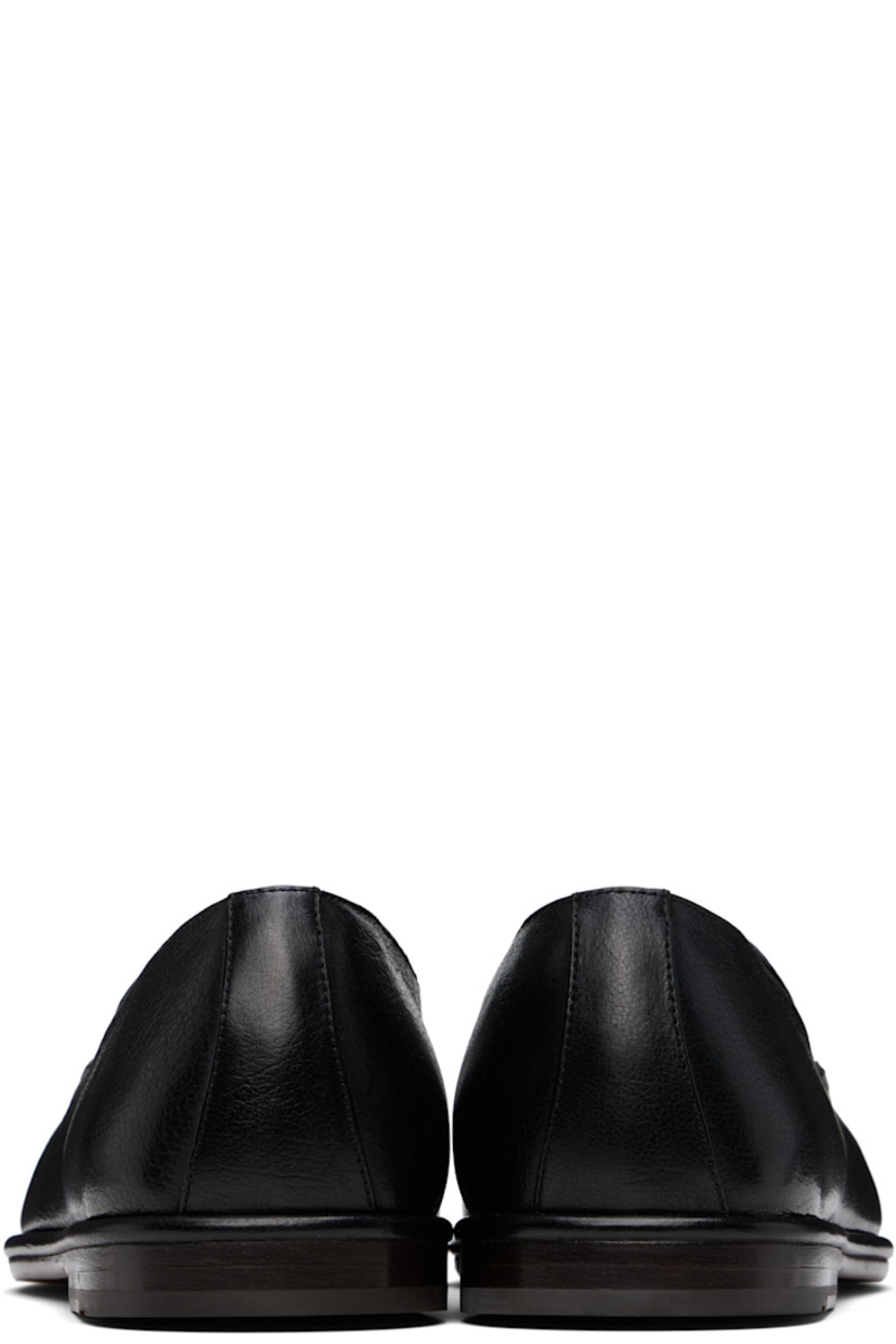 Hammered calfskin loafers in black. 

· Square moc toe
· Gold-tone logo stamp at tongue
· Grained calfskin lining
· Stacked calfskin heel with rubber injection
· Calfskin sole

Supplier color: Black