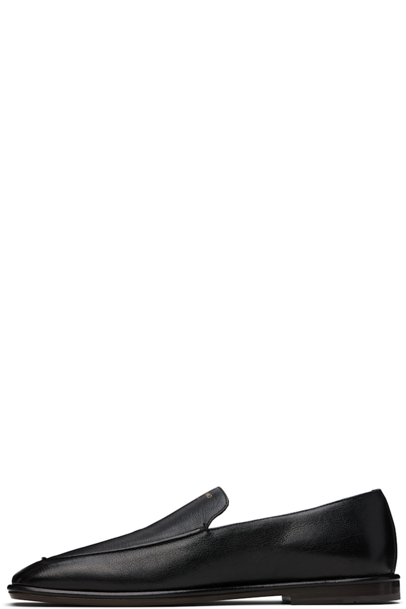 Hammered calfskin loafers in black. 

· Square moc toe
· Gold-tone logo stamp at tongue
· Grained calfskin lining
· Stacked calfskin heel with rubber injection
· Calfskin sole

Supplier color: Black