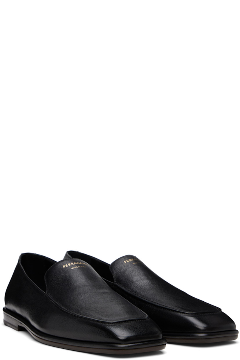 Hammered calfskin loafers in black. 

· Square moc toe
· Gold-tone logo stamp at tongue
· Grained calfskin lining
· Stacked calfskin heel with rubber injection
· Calfskin sole

Supplier color: Black
