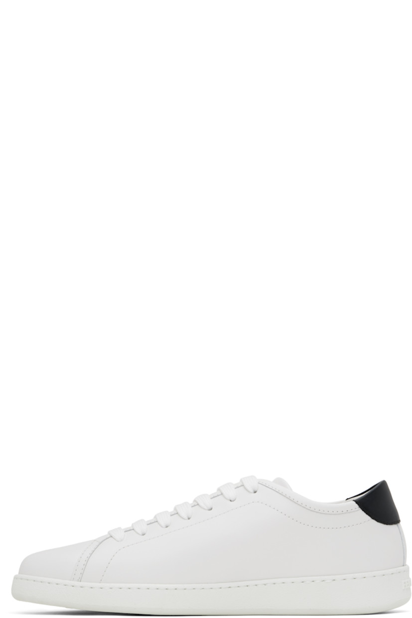 Low-top buffed calfskin sneakers in white.

· Lace-up closure
· Logo embossed at padded tongue
· Padded collar
· Logo graphic printed at outer side
· Logo embossed at heel
· Treaded rubber sole

Supplier color: Bianco ottico/Nero