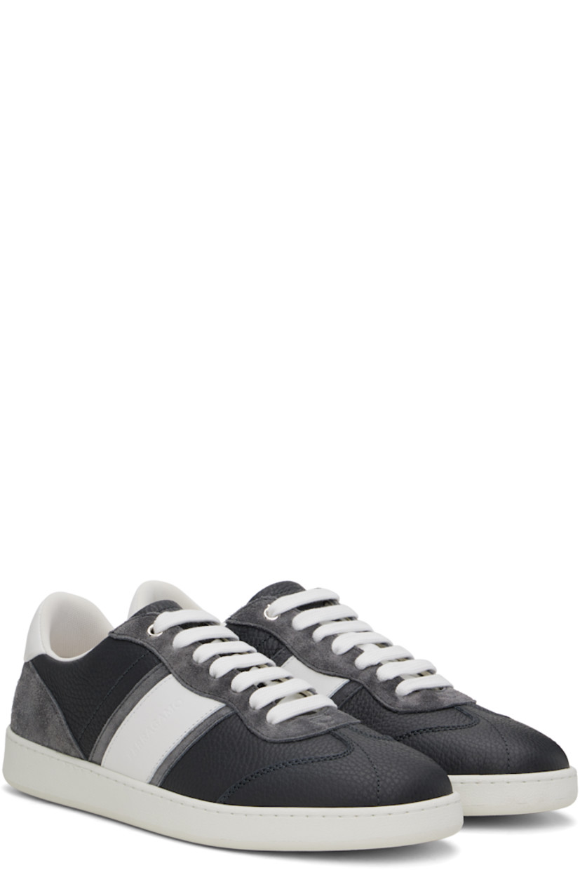 Low-top paneled calfskin suede and grained calfskin sneakers in gray and white.

· Lace-up closure
· Logo embossed at tongue, outer side, and heel
· Padded tongue and collar
· Mesh lining
· Crêpe rubber midsole
· Treaded rubber sole

Supplier color: Stromboli sand/Optic white