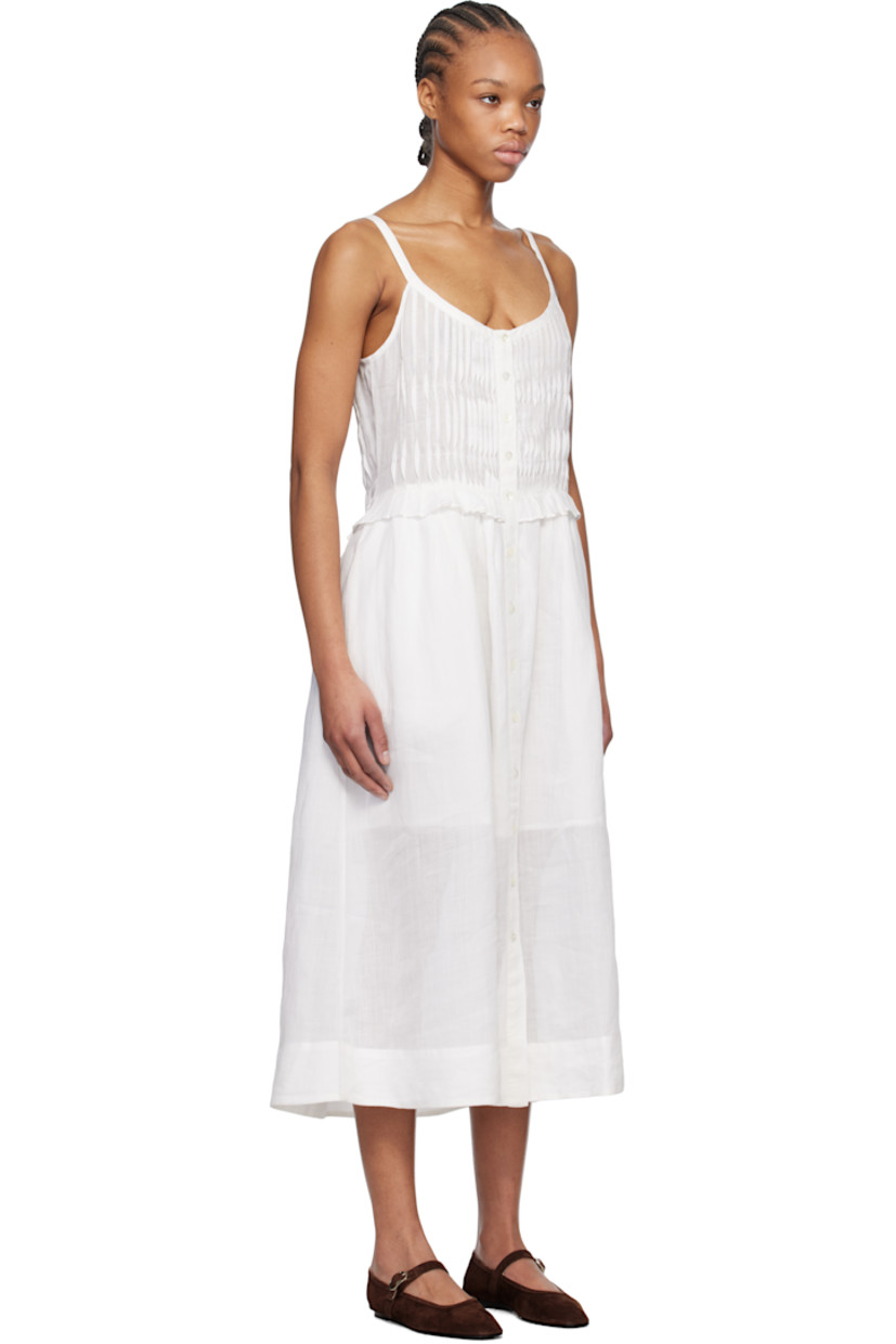 Semi-sheer ramie gauze midi dress.

· Scoop neck
· Button closure at front
· Pintucks at bust
· Ruffled edge and gathering at waist
· Fixed shoulder straps
· Partial plain-woven cotton lining
· Logo-engraved mother-of-pearl hardware

Supplier color: Pearl
