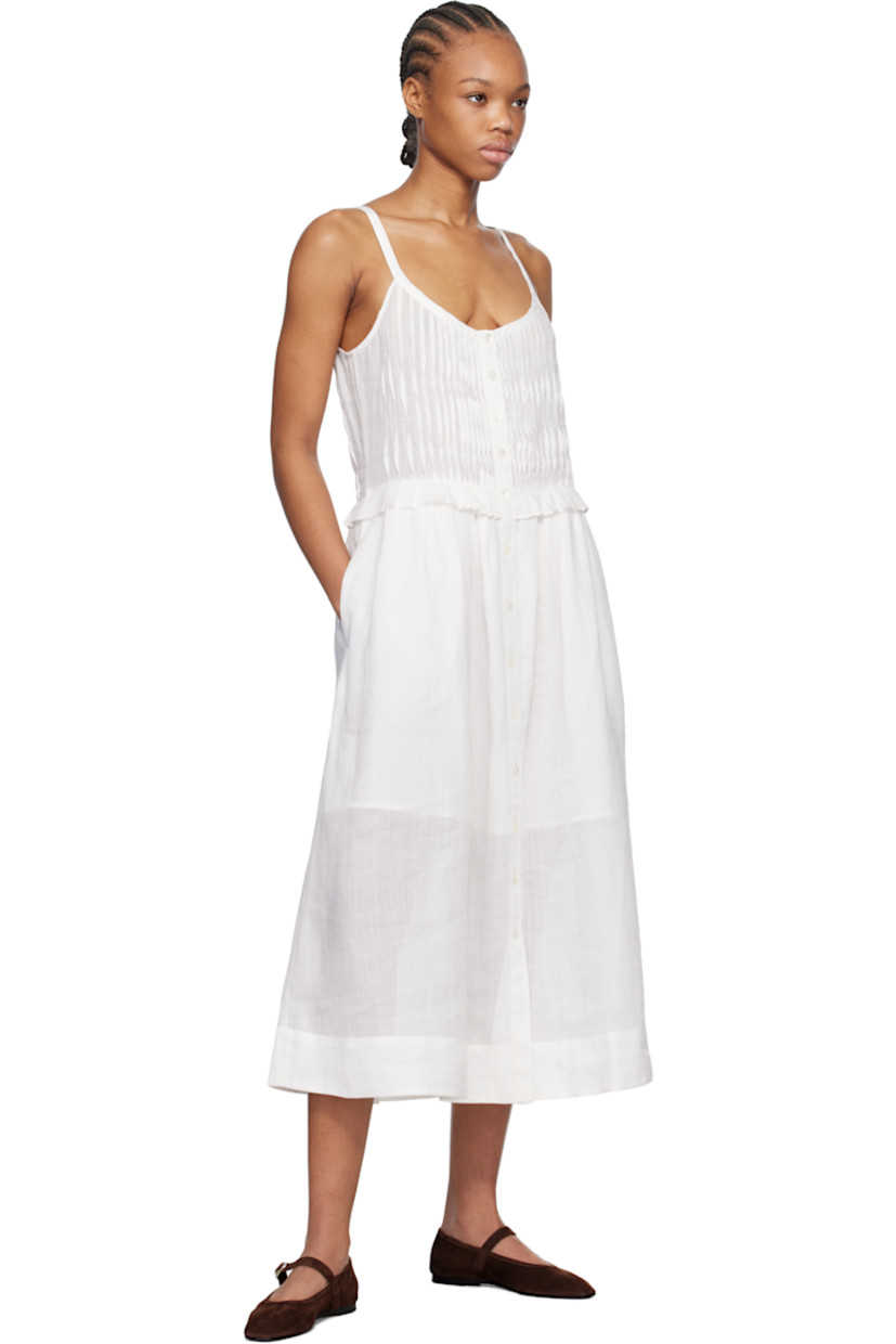 Semi-sheer ramie gauze midi dress.

· Scoop neck
· Button closure at front
· Pintucks at bust
· Ruffled edge and gathering at waist
· Fixed shoulder straps
· Partial plain-woven cotton lining
· Logo-engraved mother-of-pearl hardware

Supplier color: Pearl