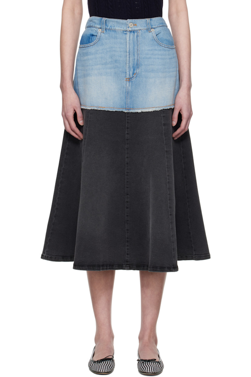 Stretch denim midi skirt. Fading, whiskering, and subtle distressing throughout.

· Paneled construction
· Belt loops
· Three-pocket styling
· Zip-fly
· Logo embroidered at back
· Contrast stitching in tan

Supplier color: Blue