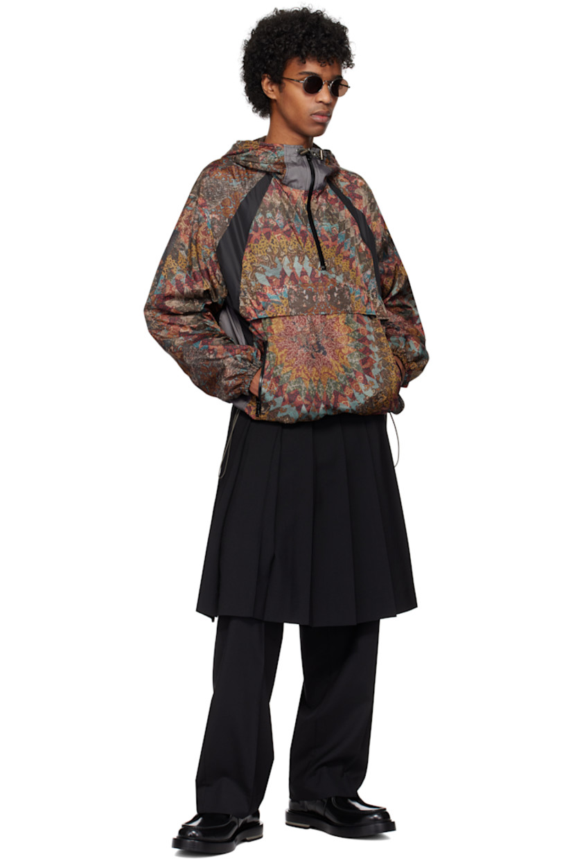 Polyester taffeta jacket. Graphic pattern printed throughout.

· Bungee-style drawstring at hood
· Half-zip closure
· Zip pockets
· Bungee-style drawstring at hem
· Panels at dropped shoulders
· Elasticized cuffs
· Mesh lining

Supplier color: Black