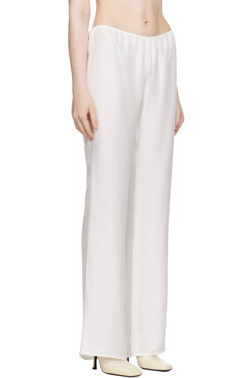 Silk twill trousers. Elasticized waistband.

Supplier color: Natural white