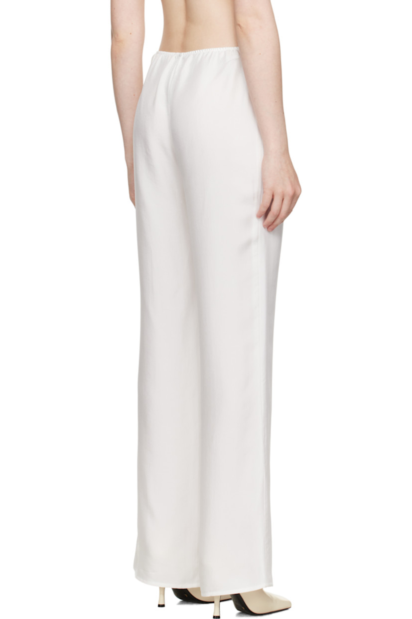 Silk twill trousers. Elasticized waistband.

Supplier color: Natural white