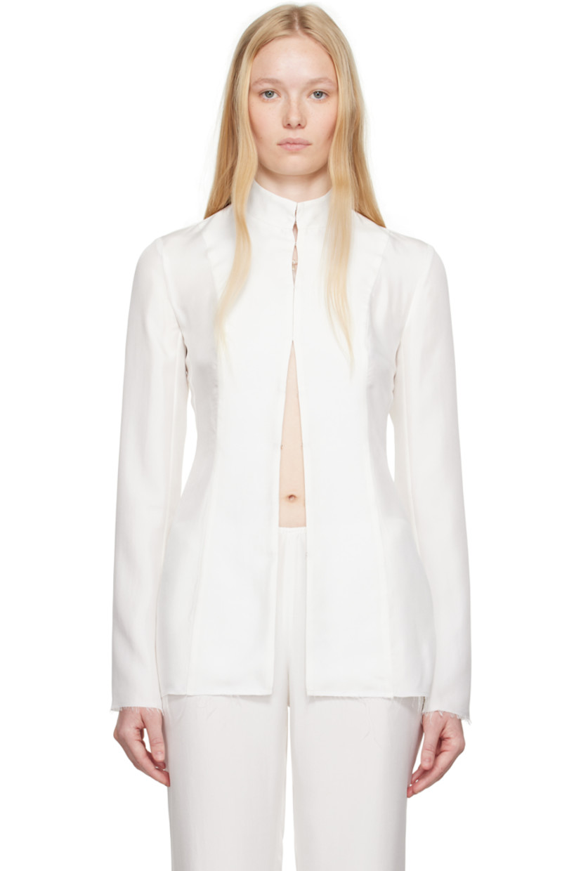 Silk twill blouse.

· Stand collar
· Hook-eye closure
· Raw edge at hem and cuffs

Supplier color: Natural white