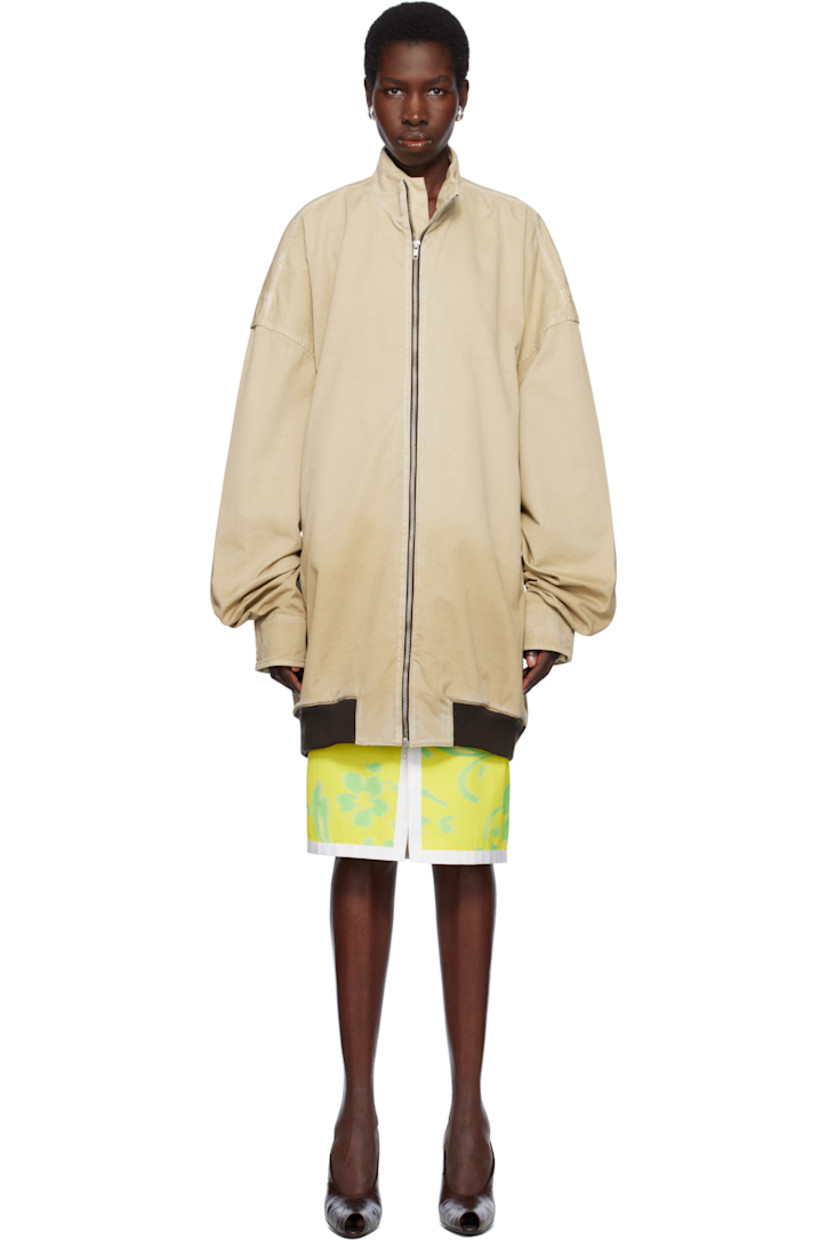 Oversized cotton twill bomber jacket. Fading and subtle distressing throughout. 

· Stand collar
· Two-way zip closure
· Welt pockets
· Rib-knit hem
· Dropped shoulders
· Velcro tab at cuffs
· Unlined

Supplier color: Beige