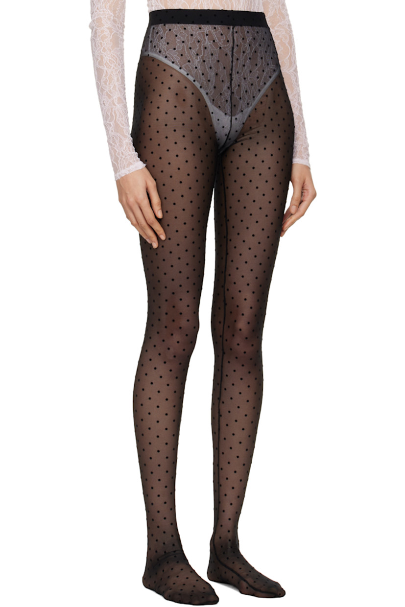 Sheer stretch nylon mesh tights. 

· Polka dot pattern flocked throughout
· Elasticized waistband

Supplier color: Black
