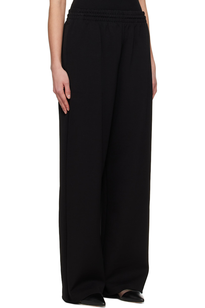Wide-leg stretch viscose-blend jersey lounge pants.

· Concealed drawstring at elasticized waist
· Three-pocket styling

Supplier color: Black