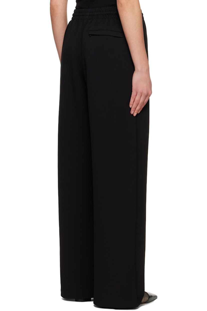 Wide-leg stretch viscose-blend jersey lounge pants.

· Concealed drawstring at elasticized waist
· Three-pocket styling

Supplier color: Black