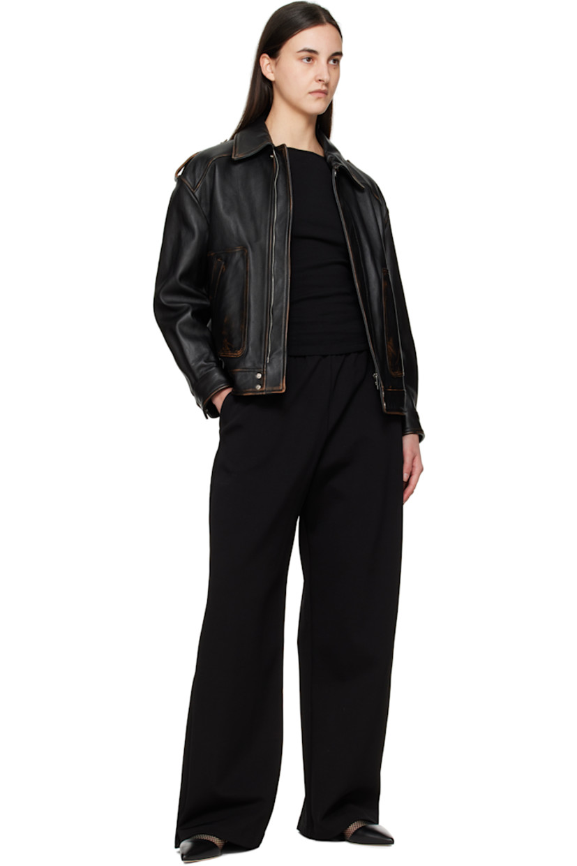 Wide-leg stretch viscose-blend jersey lounge pants.

· Concealed drawstring at elasticized waist
· Three-pocket styling

Supplier color: Black
