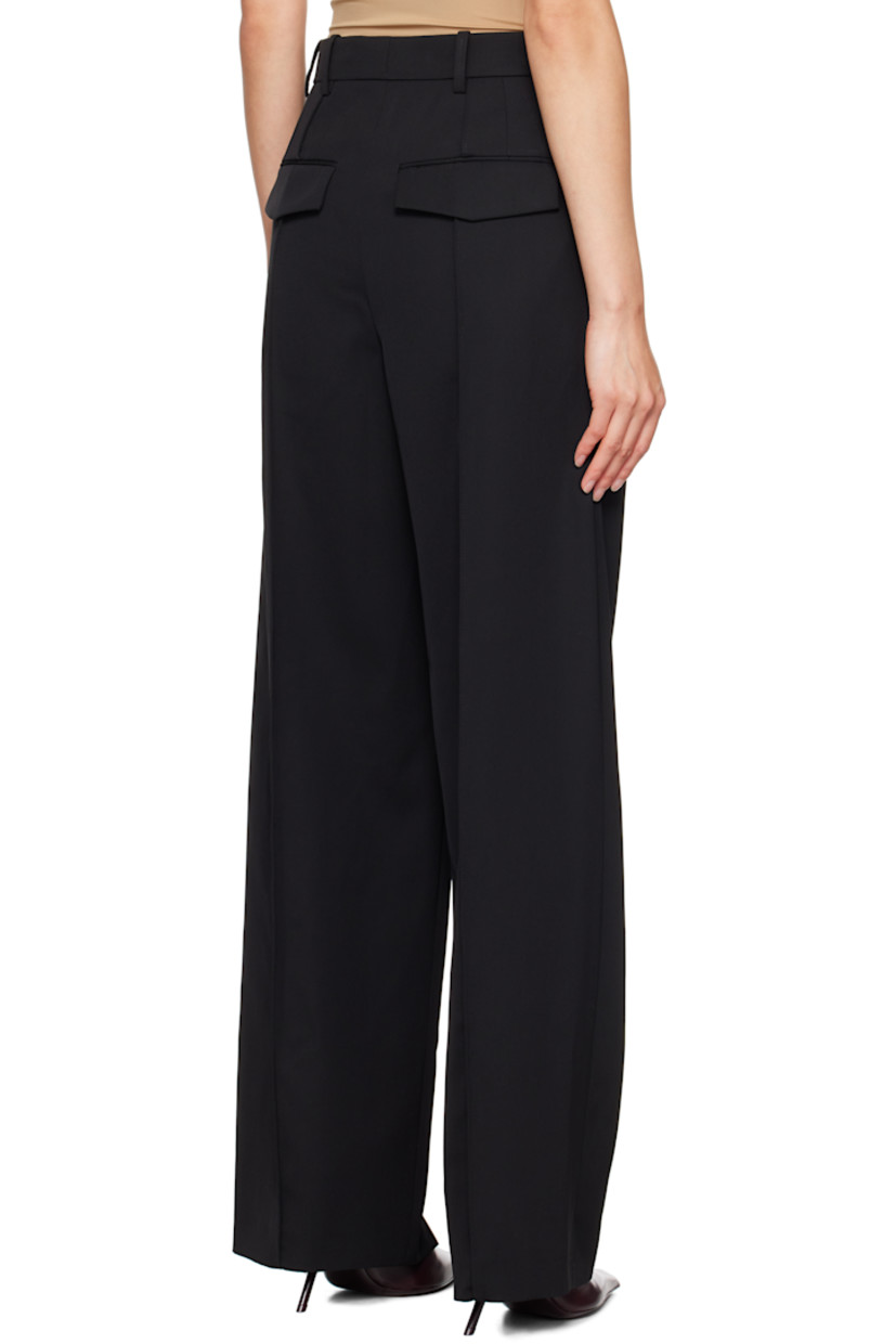 Wide-leg and tapered wool twill trousers. 

· Belt loops 
· Four-pocket styling
· Zip-fly
· Pleats at front 
· Pinched seam at front and back legs
· Darts at back waistband 

Part of the WARDROBE.NYC x Rosie Huntington-Whiteley collaboration.

Supplier color: Black