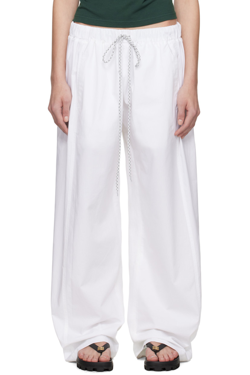 Cotton poplin and linen flannel trousers.

· Paneled construction
· Drawstring at partially elasticized waistband
· Three-pocket styling

Supplier color: White