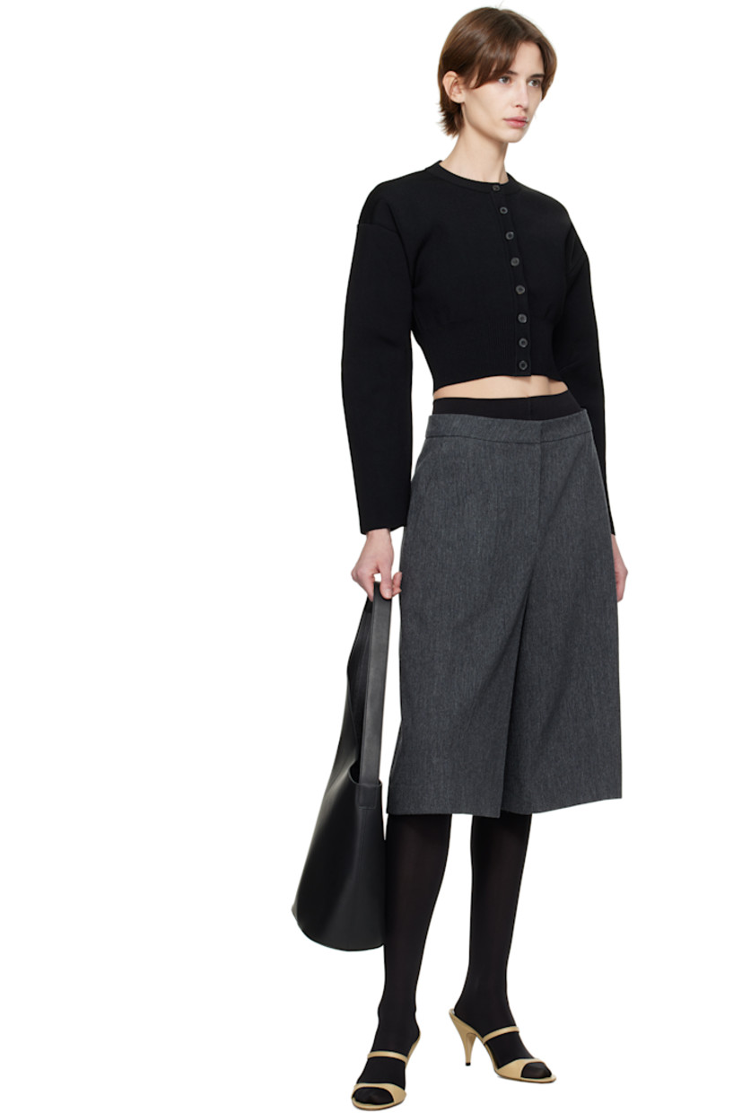 Rib-knit viscose-blend cardigan.

· Crewneck
· Button closure
· Cropped hem
· Dropped shoulders
· Pleats at sleeves

Supplier color: Black