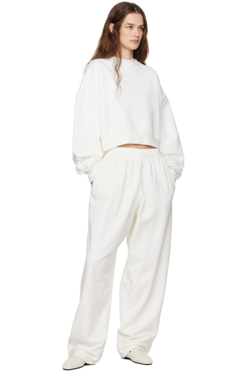 French terry sweatshirt.

· Rib knit crewneck, hem, and cuffs
· Cropped hem
· Dropped shoulders

Part of the WARDROBE.NYC x Hailey Bieber collaboration.

Supplier color: Off-White