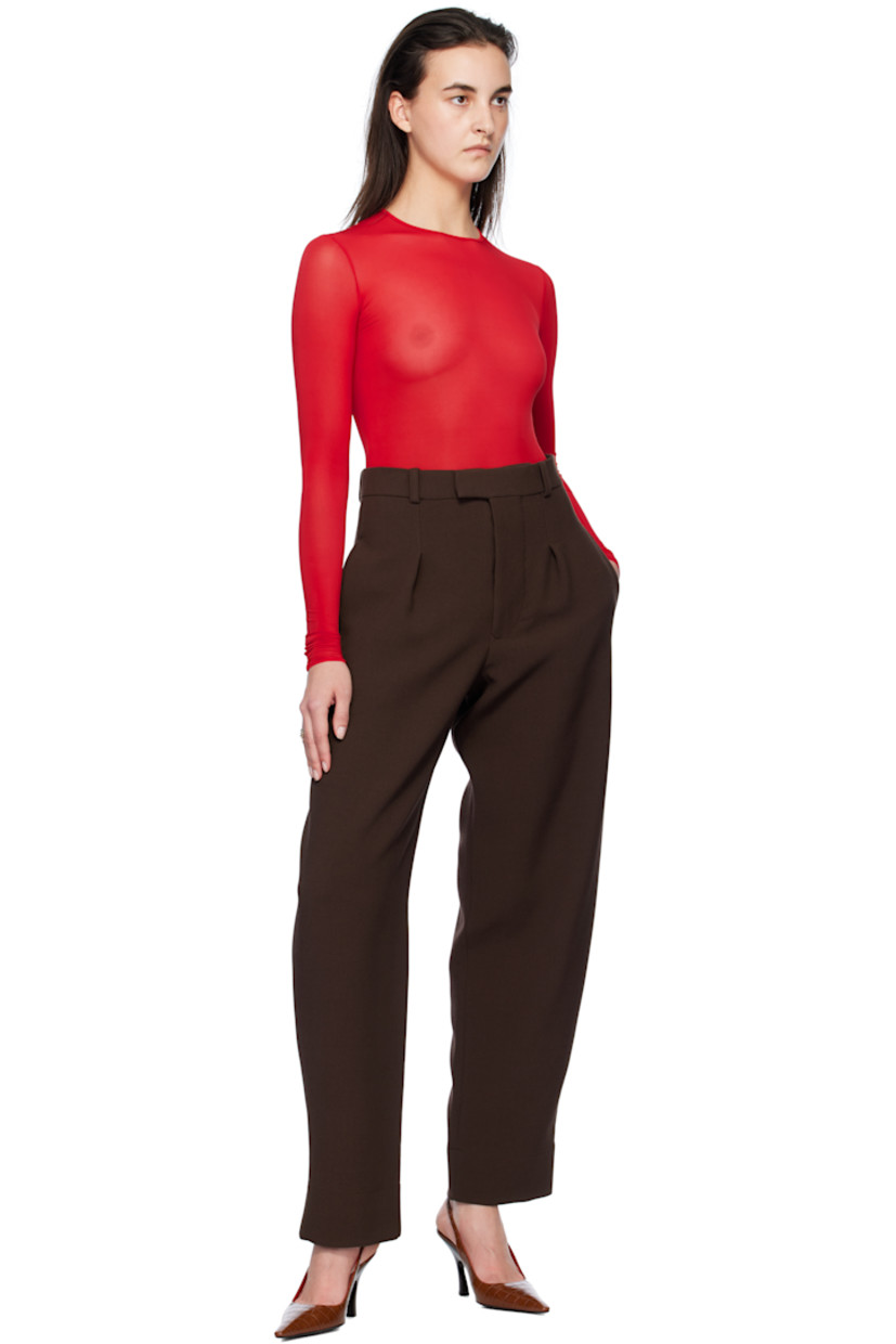 Semi-sheer stretch viscose jersey bodysuit. 

· Round neck
· Elasticized leg openings
· Press-stud fastening at bottom
· Partially lined

Supplier color: Red