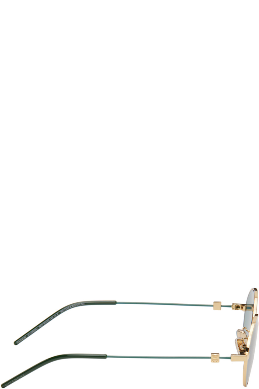 Round metal-frame sunglasses in gold tone.

· Green lenses
· 100% UVA/UVB protection, Category 3
· Adjustable rubber nose pads
· Logo hardware at temples
· Logo etched at nylon temple tips
· Includes pouch
· Size: 51.20 145

Supplier color: Green/Golden