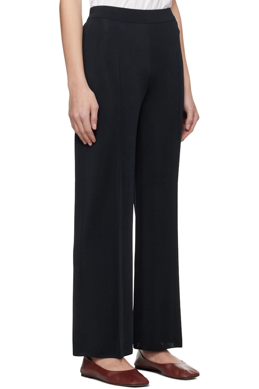 Knit viscose-blend trousers. 

· Elasticized waistband
· Pinched seam at legs
· Mock welt pockets at back 

Supplier color: Navy