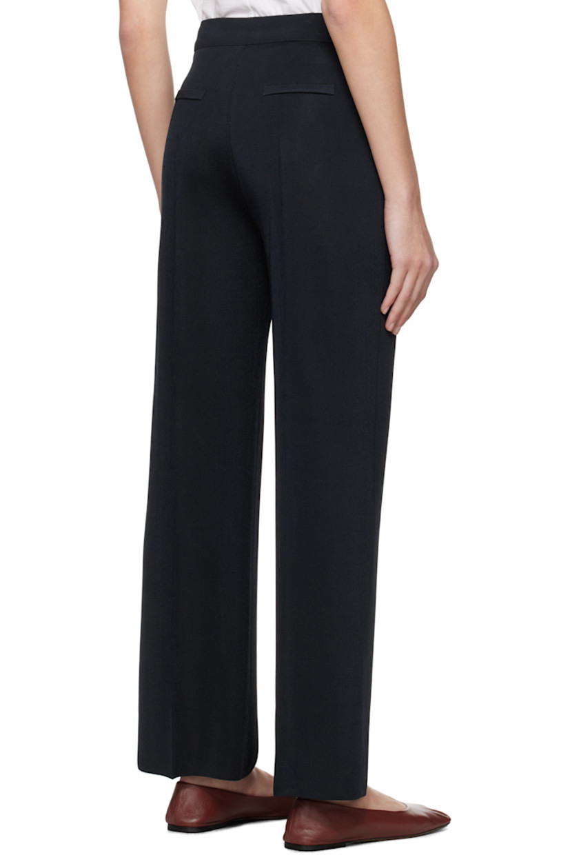 Knit viscose-blend trousers. 

· Elasticized waistband
· Pinched seam at legs
· Mock welt pockets at back 

Supplier color: Navy