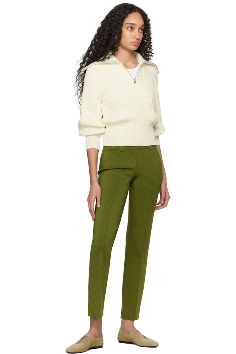 Knit stretch viscose-blend trousers. Subtle jacquard check pattern throughout.

· Belt loops at elasticized waistband
· Pinched seam at legs
· Mock welt pockets at back

Supplier color: Moss