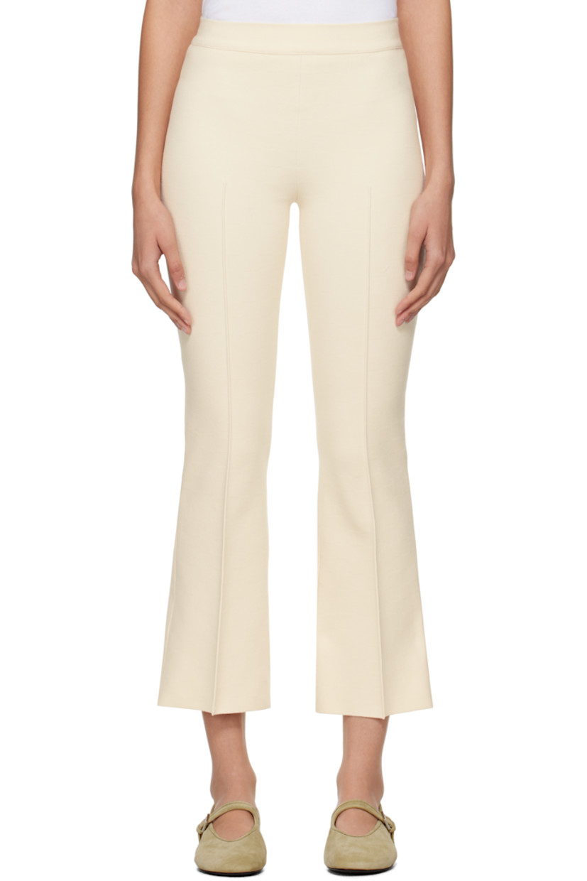 Flared knit stretch cotton-blend trousers. Subtle jacquard check pattern throughout.

· Elasticized waistband
· Pinched seam at cropped legs
· Mock welt pockets at back

Supplier color: Ivory