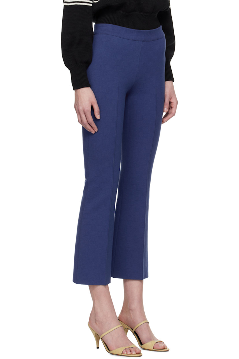 Flared knit stretch cotton-blend trousers. Subtle jacquard check pattern throughout.

· Elasticized waistband
· Pinched seams at front and back
· Cropped cuffs
· Mock welt pockets at back

Supplier color: Royal blue