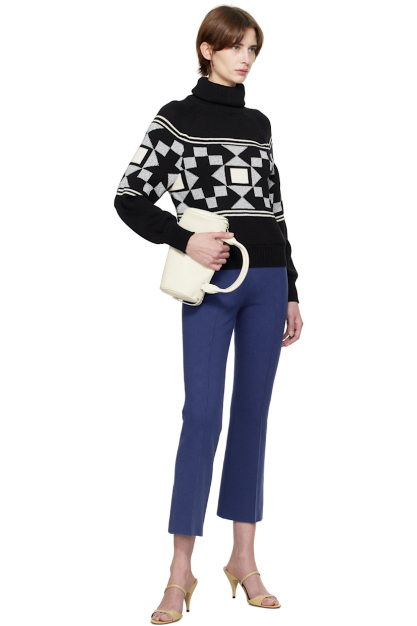 Flared knit stretch cotton-blend trousers. Subtle jacquard check pattern throughout.

· Elasticized waistband
· Pinched seams at front and back
· Cropped cuffs
· Mock welt pockets at back

Supplier color: Royal blue