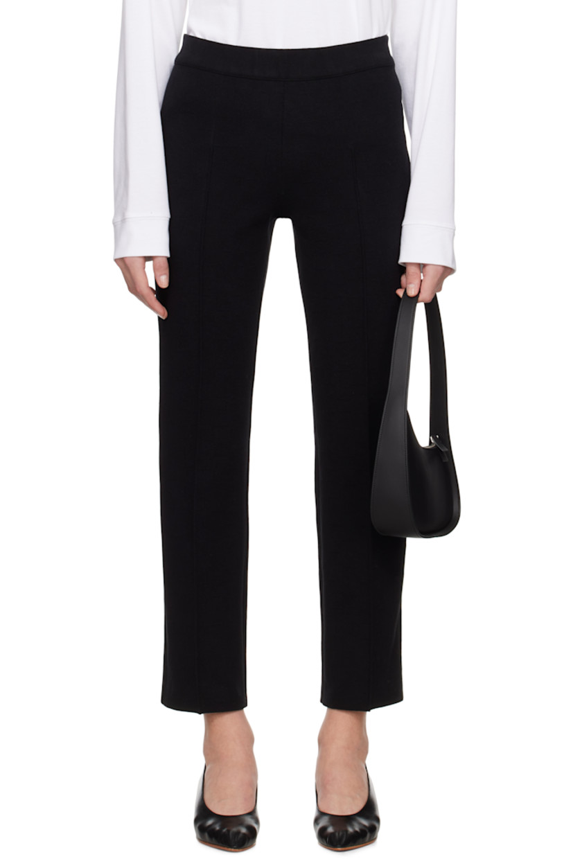 Knit stretch cotton-blend trousers. Jacquard check pattern throughout.

· Elasticized waistband
· Pinched seam at legs
· Mock welt pockets at back

Supplier color: Black