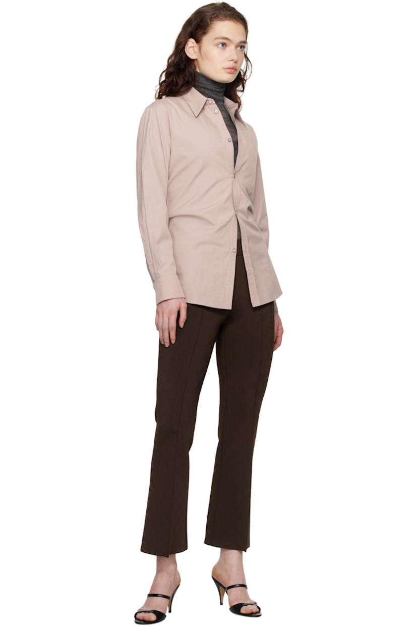 Flared knit stretch viscose-blend trousers. Subtle jacquard check pattern throughout.

· Elasticized waistband
· Cropped legs
· Pinched seams at front 
· Mock welt pockets at back

Supplier color: Chocolate