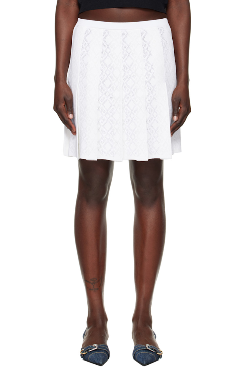 Semi-sheer pointelle-knit viscose- and nylon-blend miniskirt. Pleats and jacquard logo graphic pattern throughout.

· Elasticized waistband
· Rib-knit hem 

Supplier color: White