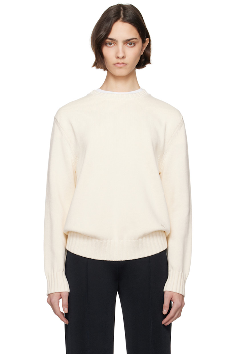 Oversized knit cotton sweater.

· Rib-knit crewneck, hem, and cuffs
· Logo embroidered at front
· Dropped shoulders

Supplier color: Ivory