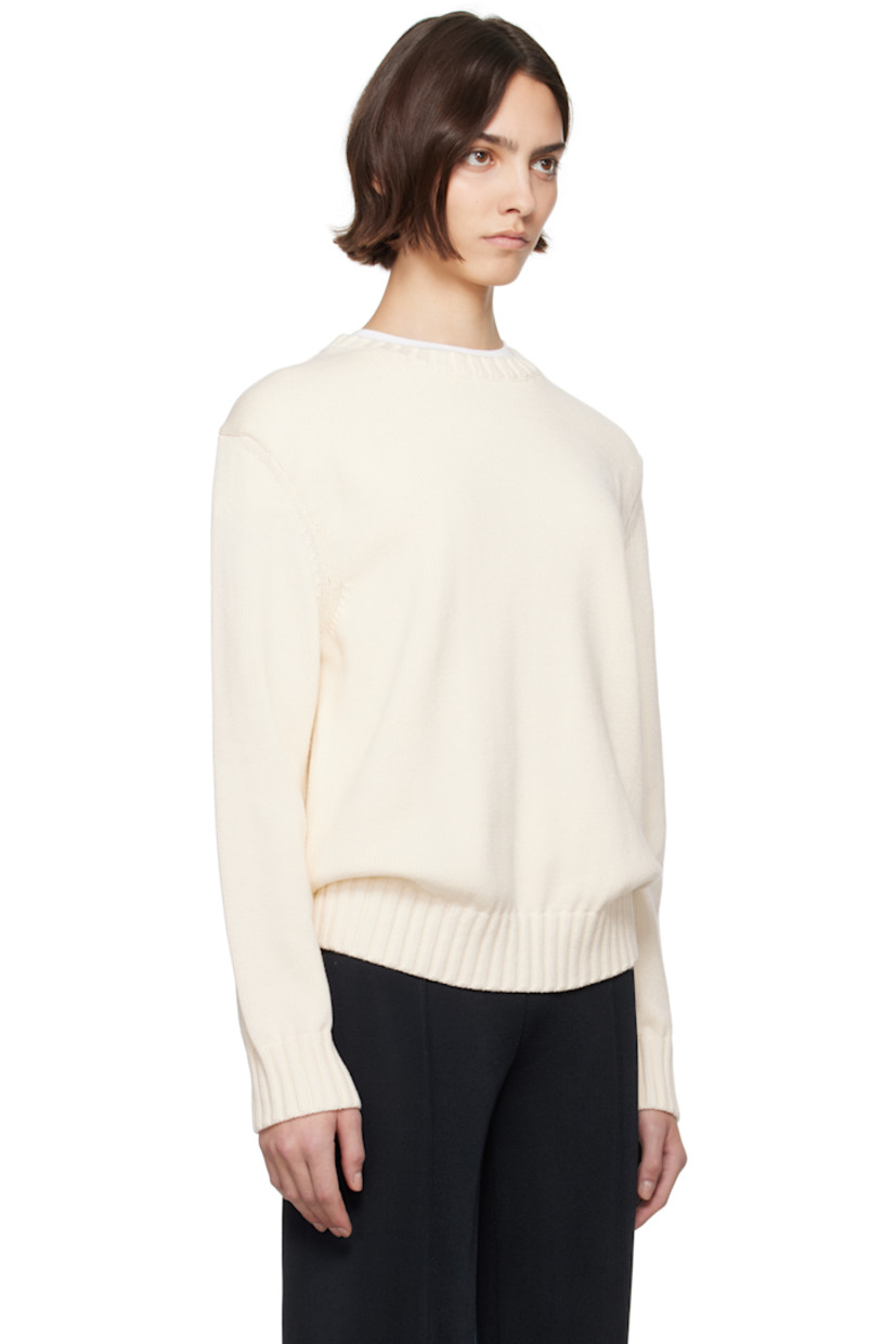 Oversized knit cotton sweater.

· Rib-knit crewneck, hem, and cuffs
· Logo embroidered at front
· Dropped shoulders

Supplier color: Ivory