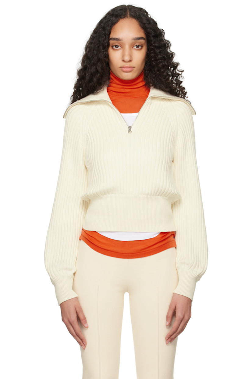 Rib-knit stretch cotton-blend sweater.

· Turtleneck converts to sailor collar 
· Half-zip closure
· Raglan sleeves

Supplier color: Ivory