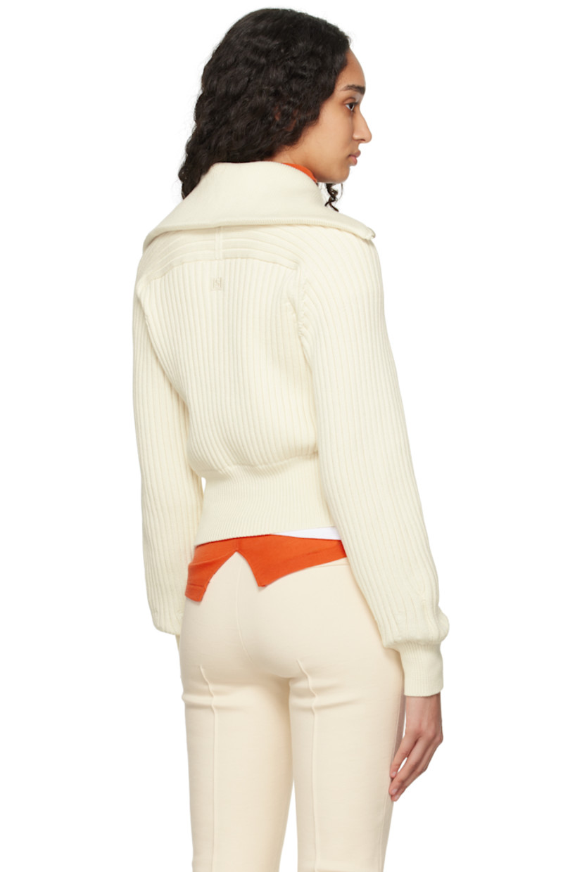 Rib-knit stretch cotton-blend sweater.

· Turtleneck converts to sailor collar 
· Half-zip closure
· Raglan sleeves

Supplier color: Ivory