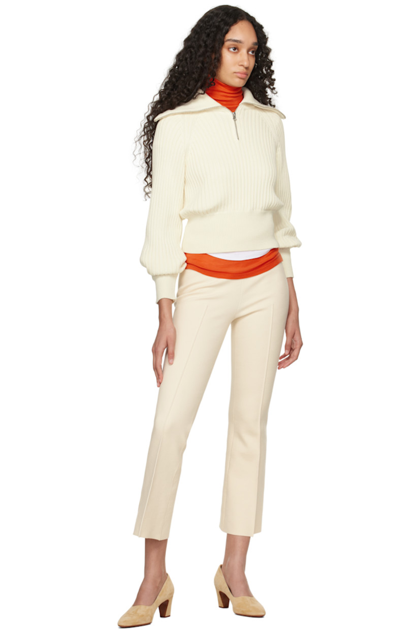 Rib-knit stretch cotton-blend sweater.

· Turtleneck converts to sailor collar 
· Half-zip closure
· Raglan sleeves

Supplier color: Ivory
