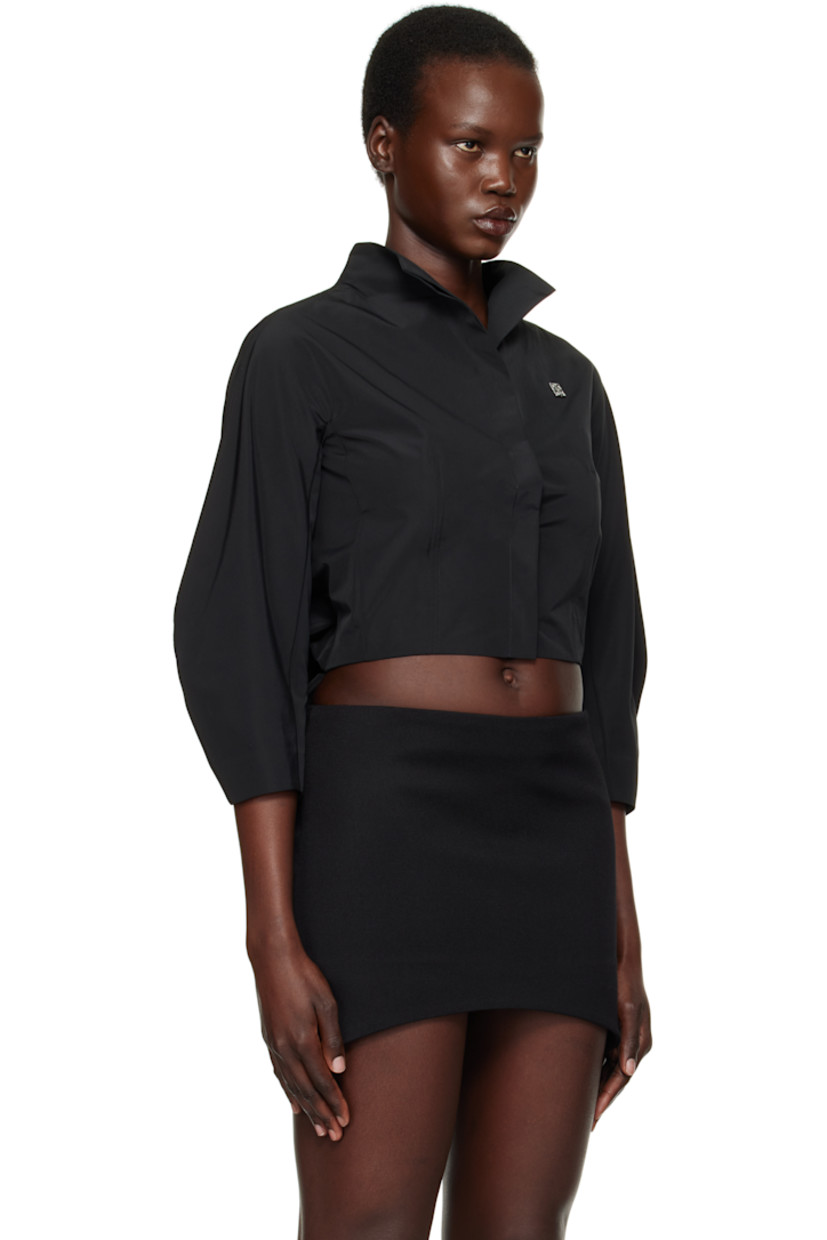 Cotton poplin shirt. 

· Mock neck
· Concealed button closure
· Silver-tone logo hardware at chest
· Cropped hem
· Saddle shoulders
· Balloon sleeves
· Gathering at back hem 

Supplier color: Black