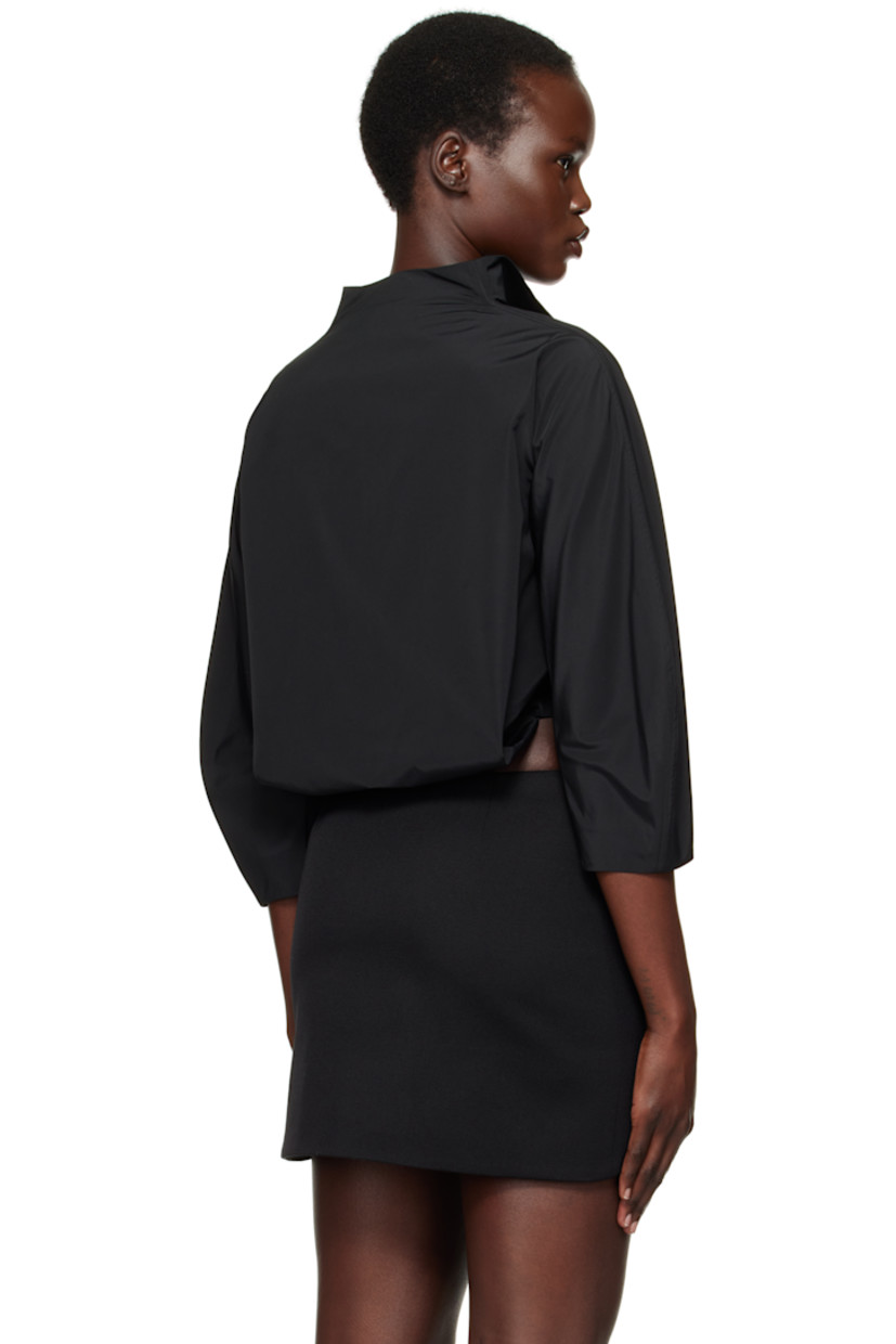 Cotton poplin shirt. 

· Mock neck
· Concealed button closure
· Silver-tone logo hardware at chest
· Cropped hem
· Saddle shoulders
· Balloon sleeves
· Gathering at back hem 

Supplier color: Black