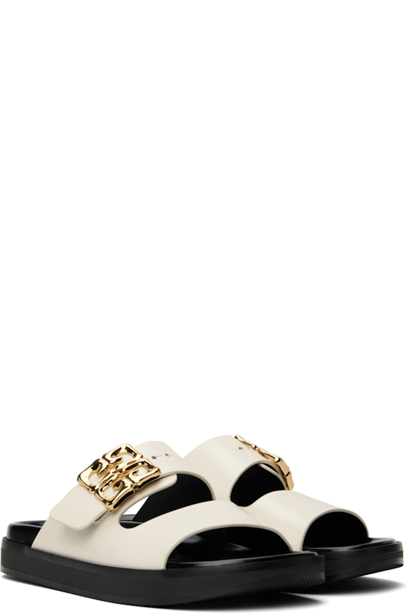 Patent calfskin flat sandals in off-white.

· Open square toe
· Logo post-stud strap at vamp
· Logo stamp at polished leather footbed
· Grained leather lining
· Treaded rubber sole

Supplier color: Ivory