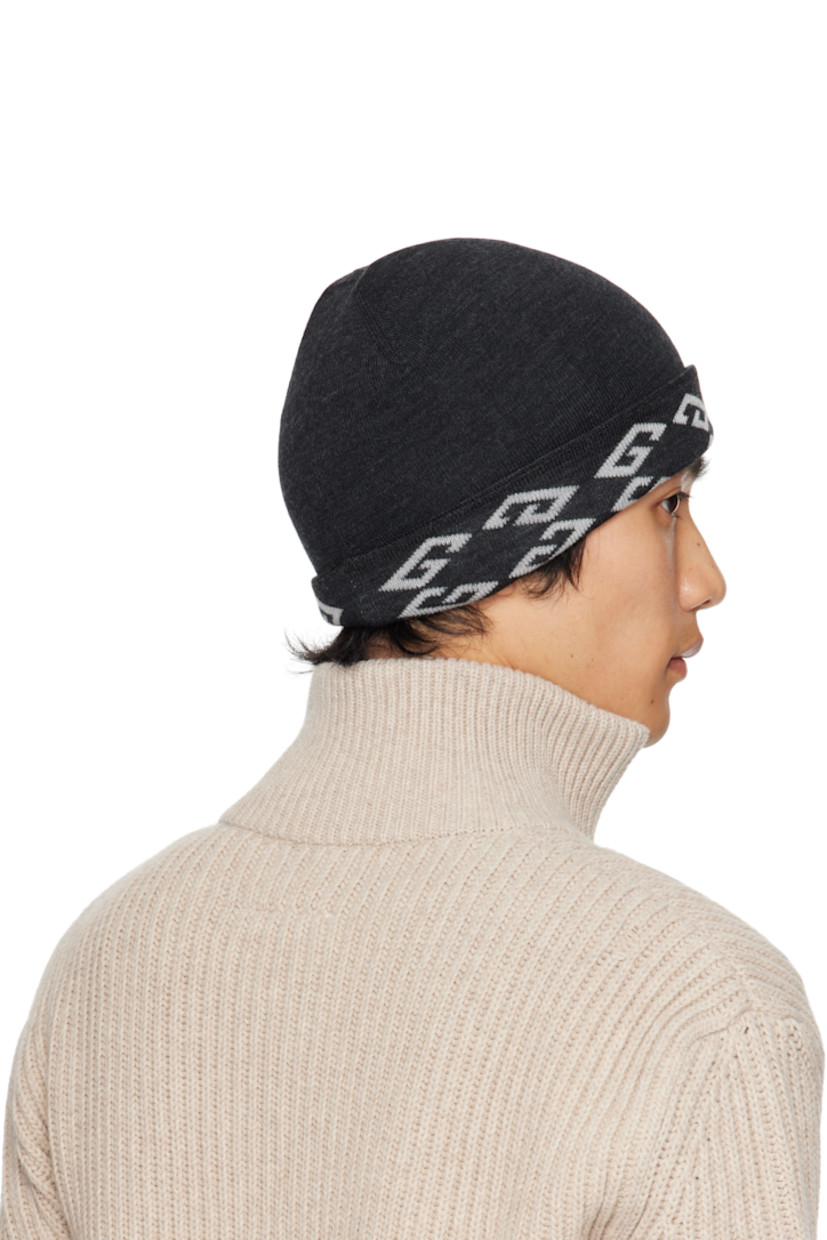 Reversible knit wool beanie. 

Reverse in gray knit wool. Jacquard logo pattern at face. 

· Jacquard logo at face 
· Rolled brim 

Supplier color: Charcoal/Light grey